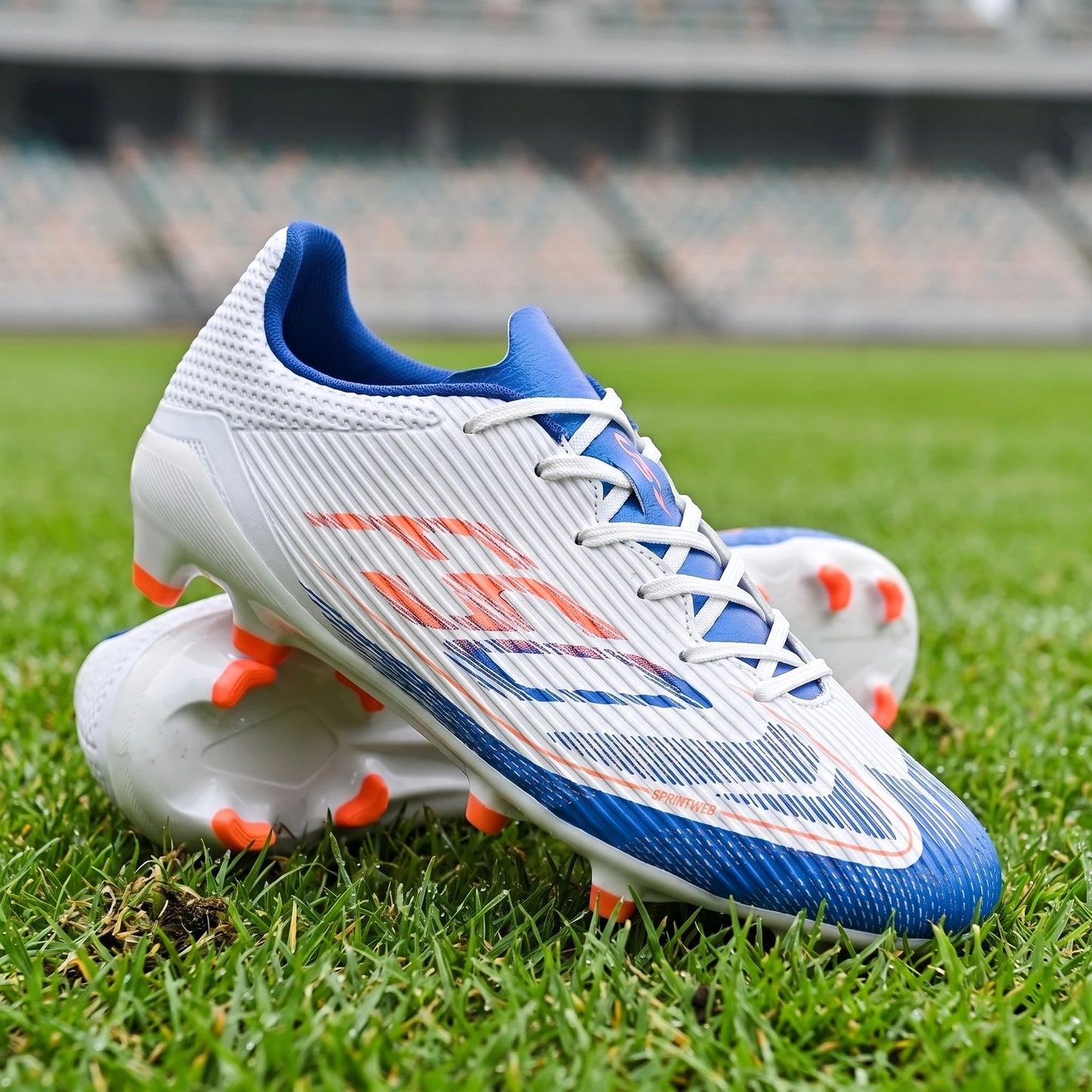 Close up view of the textured Pu upper unisex soccer cleats, showing intricate stitching and high friction TPU studs — view 7