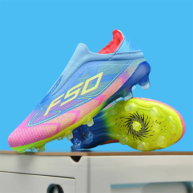 Lightweight blue and pink soccer cleats with non slip sole, displayed on a surface — view 26 — view 12