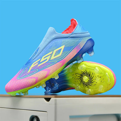Lightweight blue and pink soccer cleats with non slip sole, displayed on a surface — view 26 — view 12