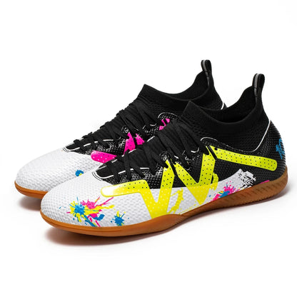 Colorful soccer cleats with vibrant splashes and durable sole, angled view — 10 — view 4
