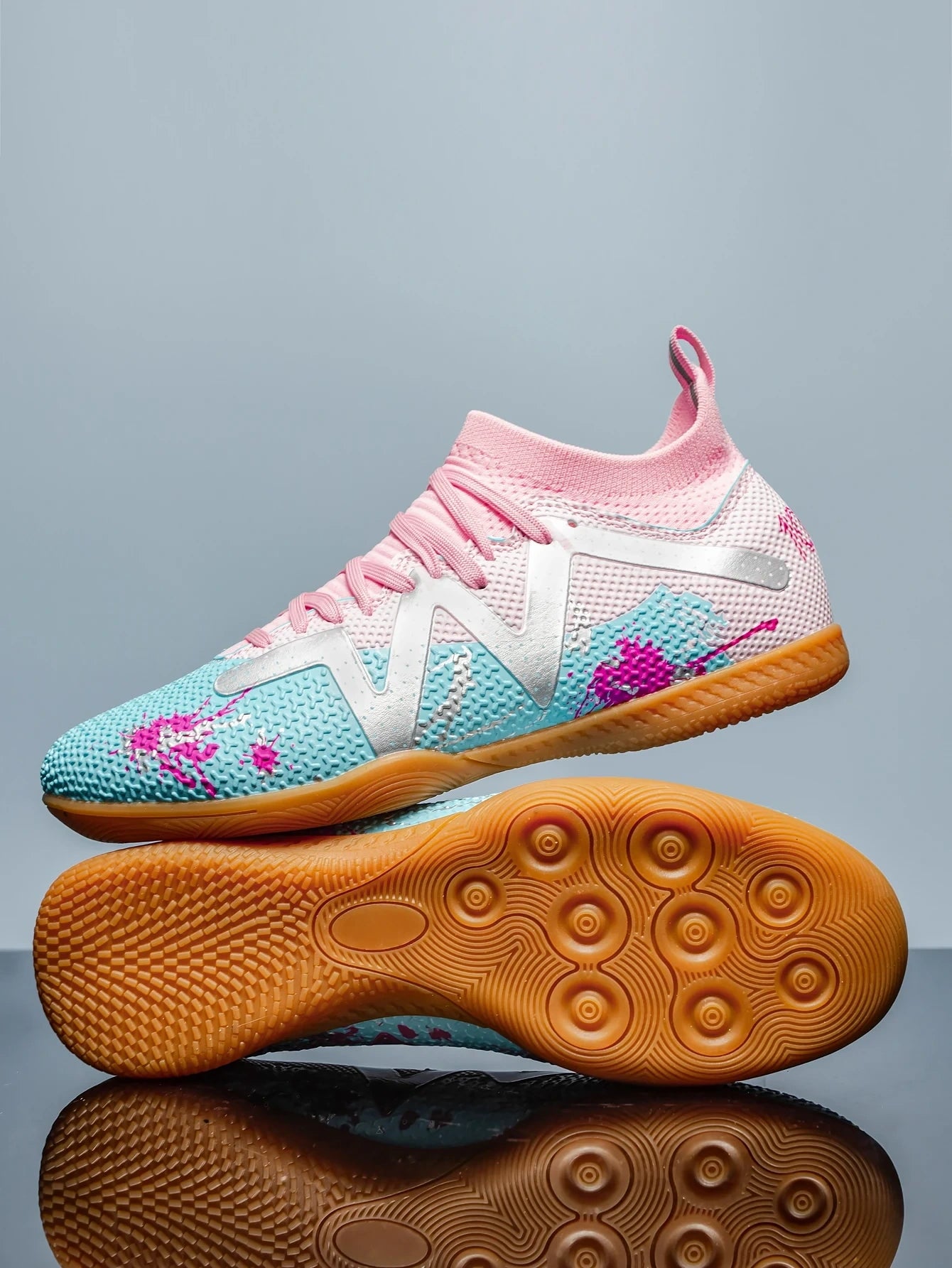 Pink and blue soccer cleats with gum sole, featuring a textured design lace up closure — view 18 — view 8