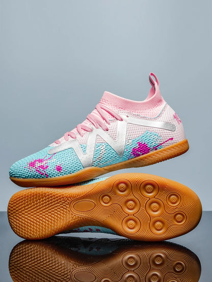 Pink and blue soccer cleats with gum sole, featuring a textured design lace up closure — view 18 — view 8