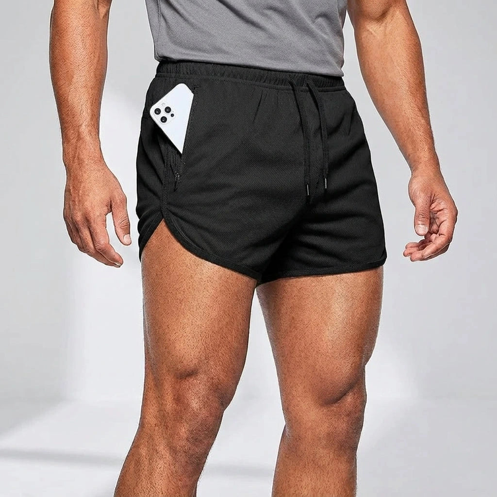 Black soccer shorts with quick drying fabric, elastic waistband, and side pocket, front view — 2 — view 3