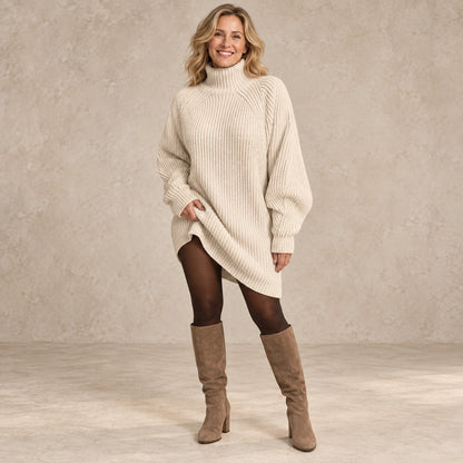sweater dress — Image; complete full front view; Beige celeste garment worn by a happy adult model