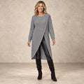 sweater dress — Image; complete full front view; Gray lina garment worn by a happy adult model
