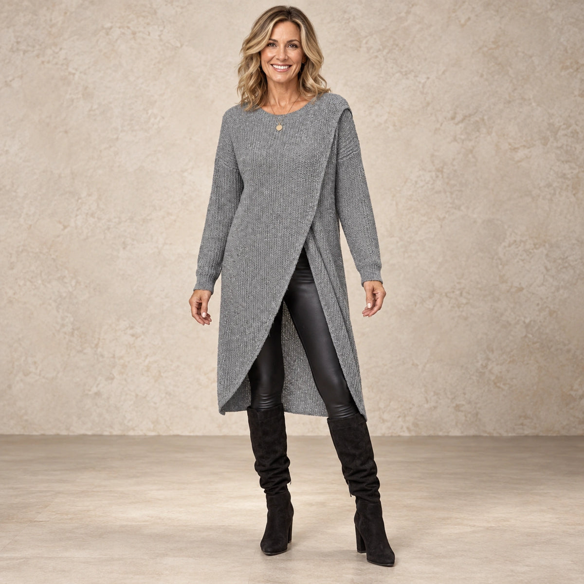 sweater dress — Image; complete full front view; Gray lina garment worn by a happy adult model
