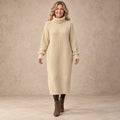 sweater dress — Image; complete full front view; Beige liora garment worn by a happy adult model