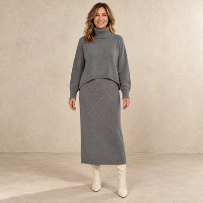 sweater dress — Image; complete full front view; Gray noemie garment worn by a happy adult model