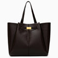 Spacious tote bag in a soft beige fabric, featuring dual handles and roomy interior for everyday essentials