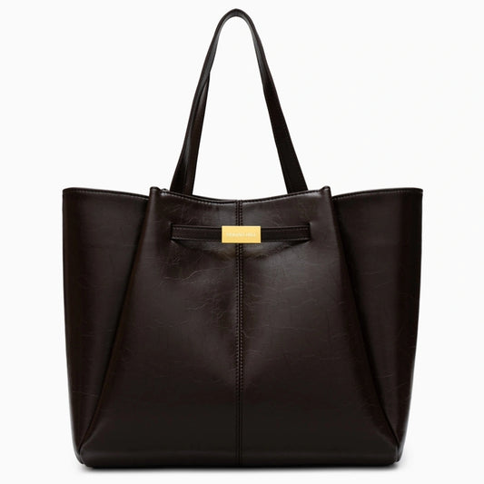 Spacious tote bag in a soft beige fabric, featuring dual handles and roomy interior for everyday essentials