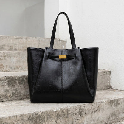 Spacious tote bag in a soft fabric, featuring sleek design and sturdy handles, viewed — view 9 — view 9
