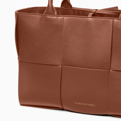 Woven tote bag in a soft beige color with sturdy handles and an open top, showcasing textured pattern — view 12 — view 12