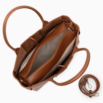 Woven tote bag in a natural color with sturdy handles and spacious interior, displayed against neutral background — view 13