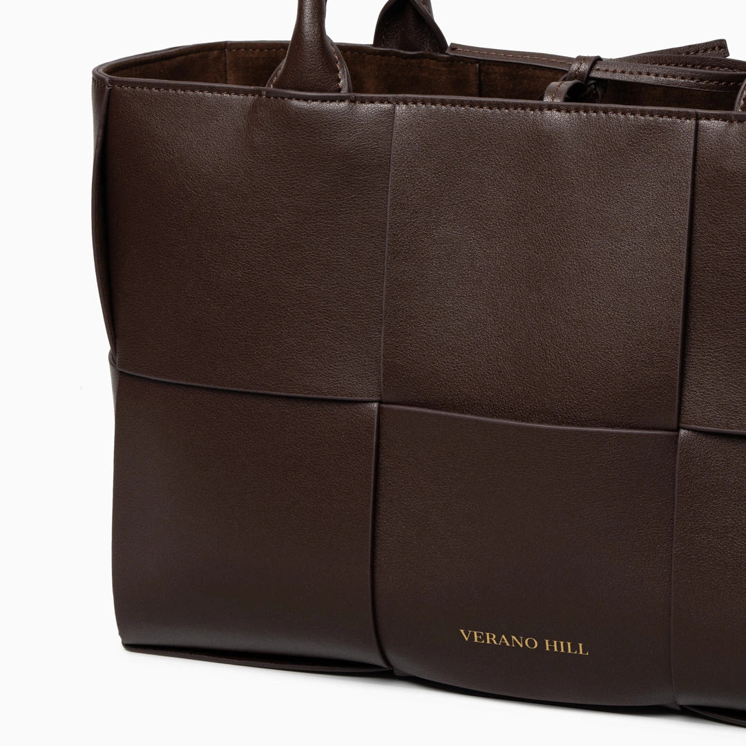 Woven tote bag in a natural color with sturdy handles, featuring spacious interior and textured design, top view — 2 — view 2