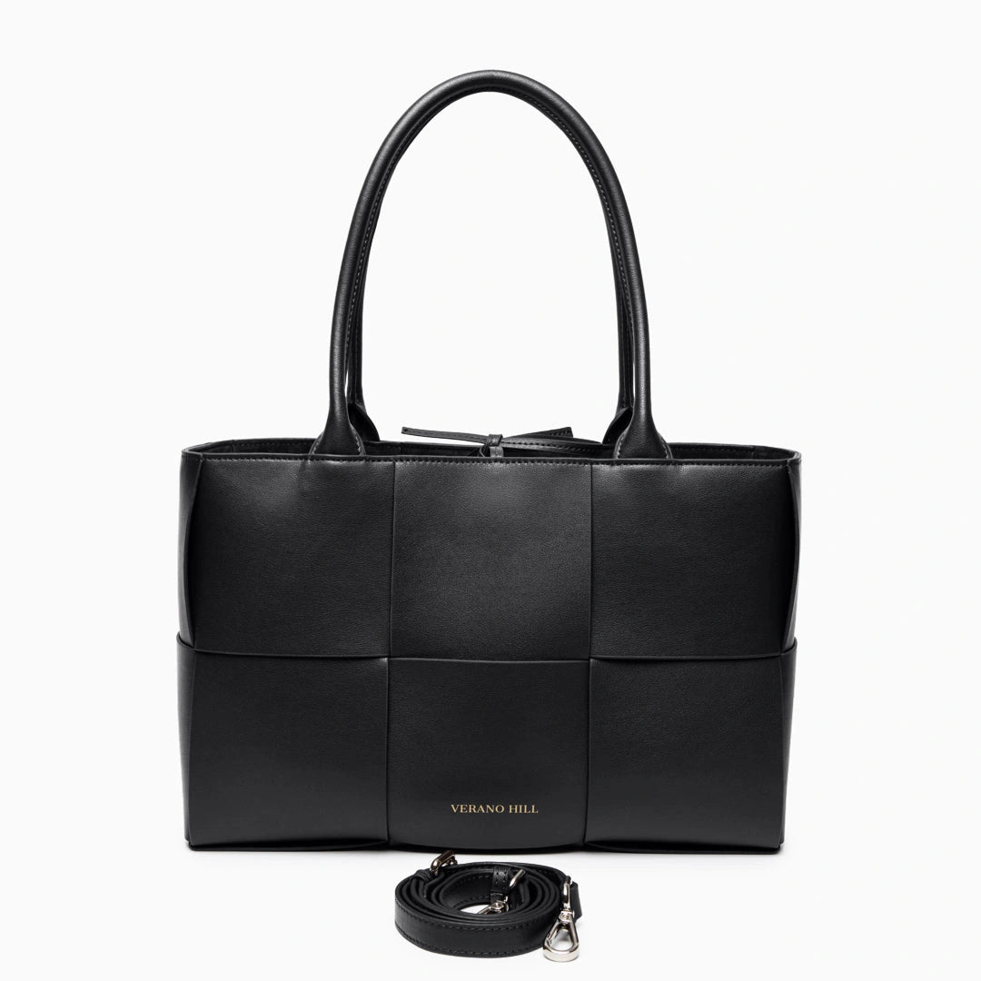 Woven tote bag in a natural beige color with sturdy handles, showcasing textured pattern and spacious interior — view 9
