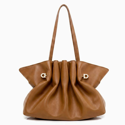 Soft beige tote bag with sturdy handles, featuring a spacious interior and minimalistic design, top view — 11 — view 11