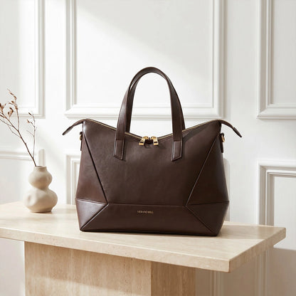 Elegant tote bag in soft gray fabric with structured design, featuring dual handles and a spacious interior, front — view 9