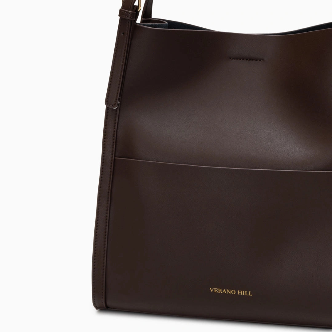 Luxurious leather tote bag in a rich brown color with spacious interior and sturdy handles, front view — 18 — view 18