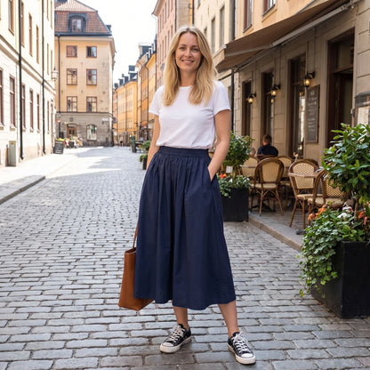 Close up view of the Casual Loose Polyester Uniform Skirt showing high waisted pleats and fine stitching details — view 4