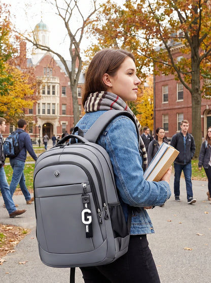 A model showcases the wear resistant multi zip university backpack in sleek black design, paired with casual outfit against