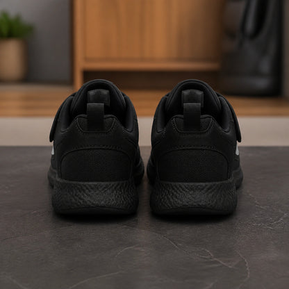 Black triple strap velcro shoes direct rear view