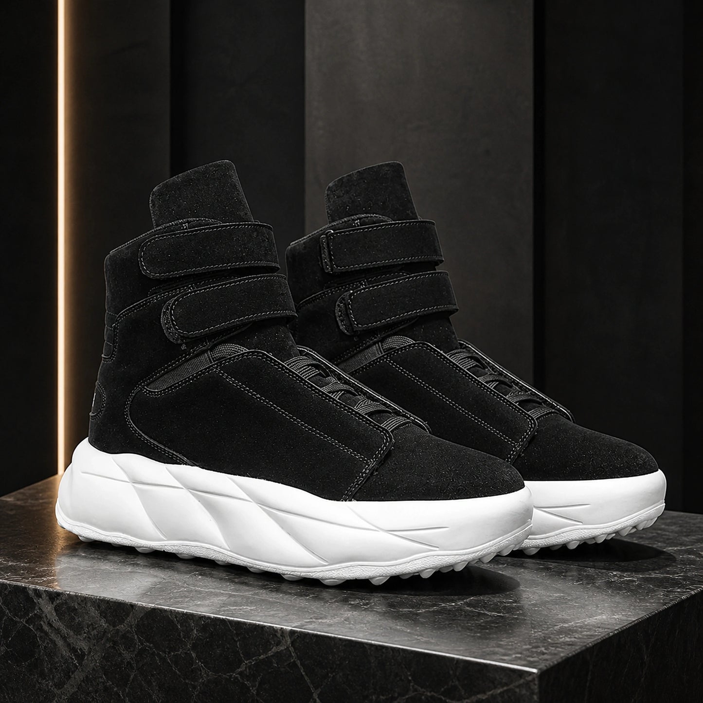 Black men's high top platform velcro shoes on a graphite set