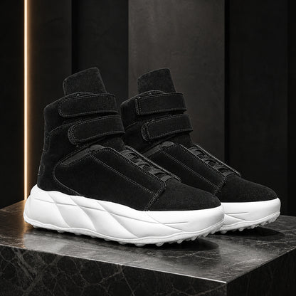 Black men's high top platform velcro shoes on a graphite set