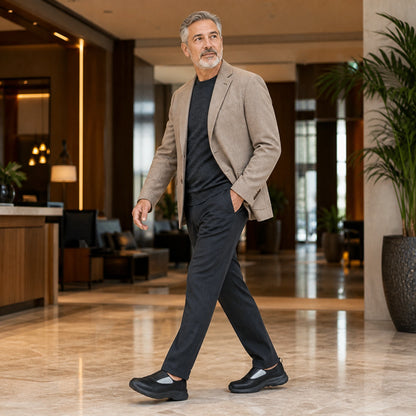 Man in his fifties wearing black wide fit velcro shoes — view 7