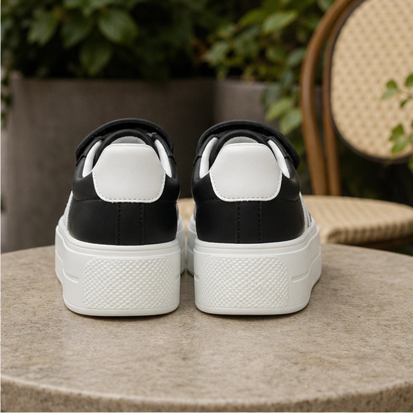 Black striped platform velcro shoes direct rear view — view 6