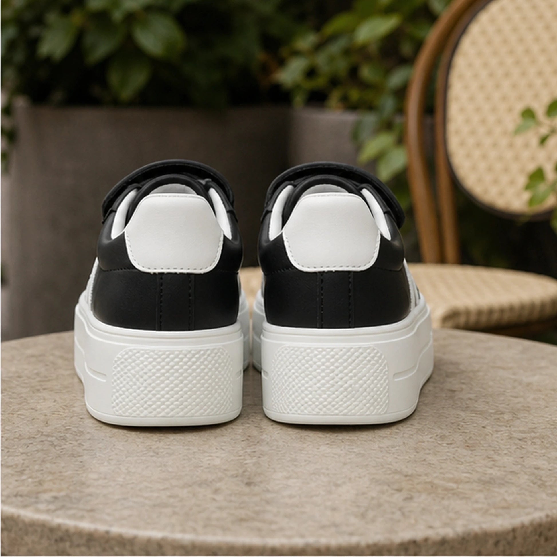 Black striped platform velcro shoes direct rear view — view 6