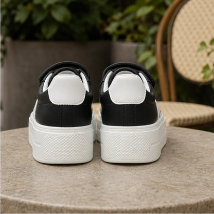 Black striped platform velcro shoes direct rear view — view 6