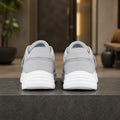 Gray men's adjustable comfort velcro shoes direct rear view
