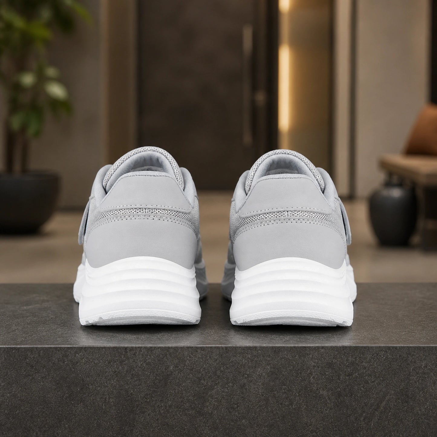 Gray men's adjustable comfort velcro shoes direct rear view