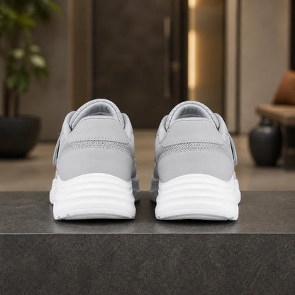 Gray men's adjustable comfort velcro shoes direct rear view