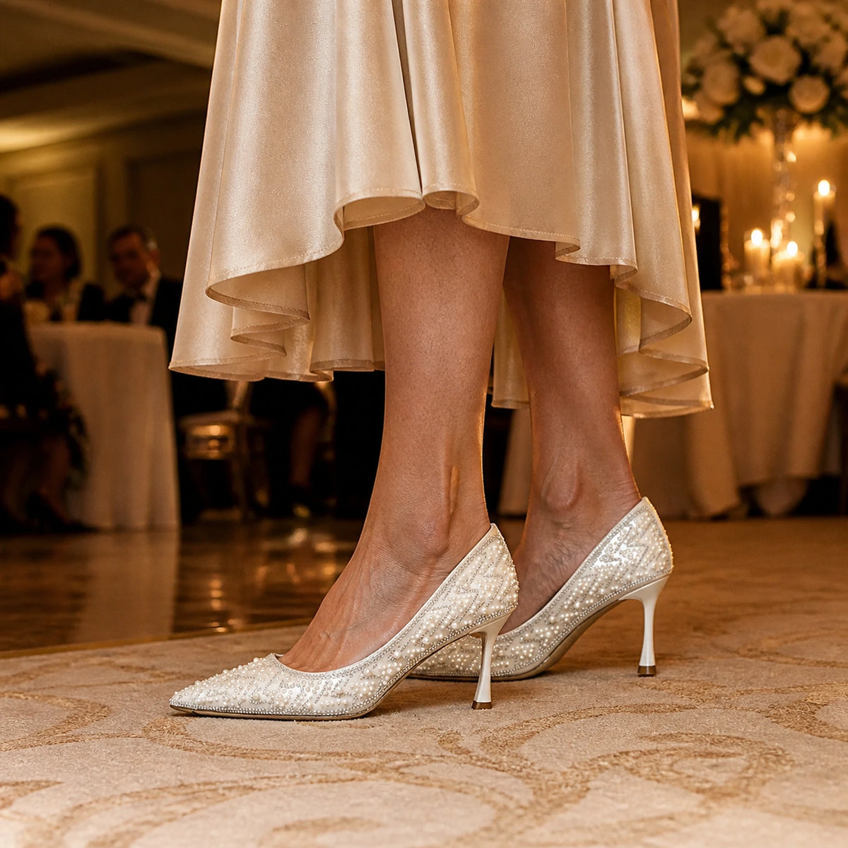 wedding guest shoes — Mature woman wearing ivory pearl 7 cm wedding guest pumps indoors — view 7