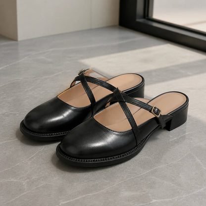 wedding guest shoes — Black cross strap backless Mary Jane pumps complete front view — view 2