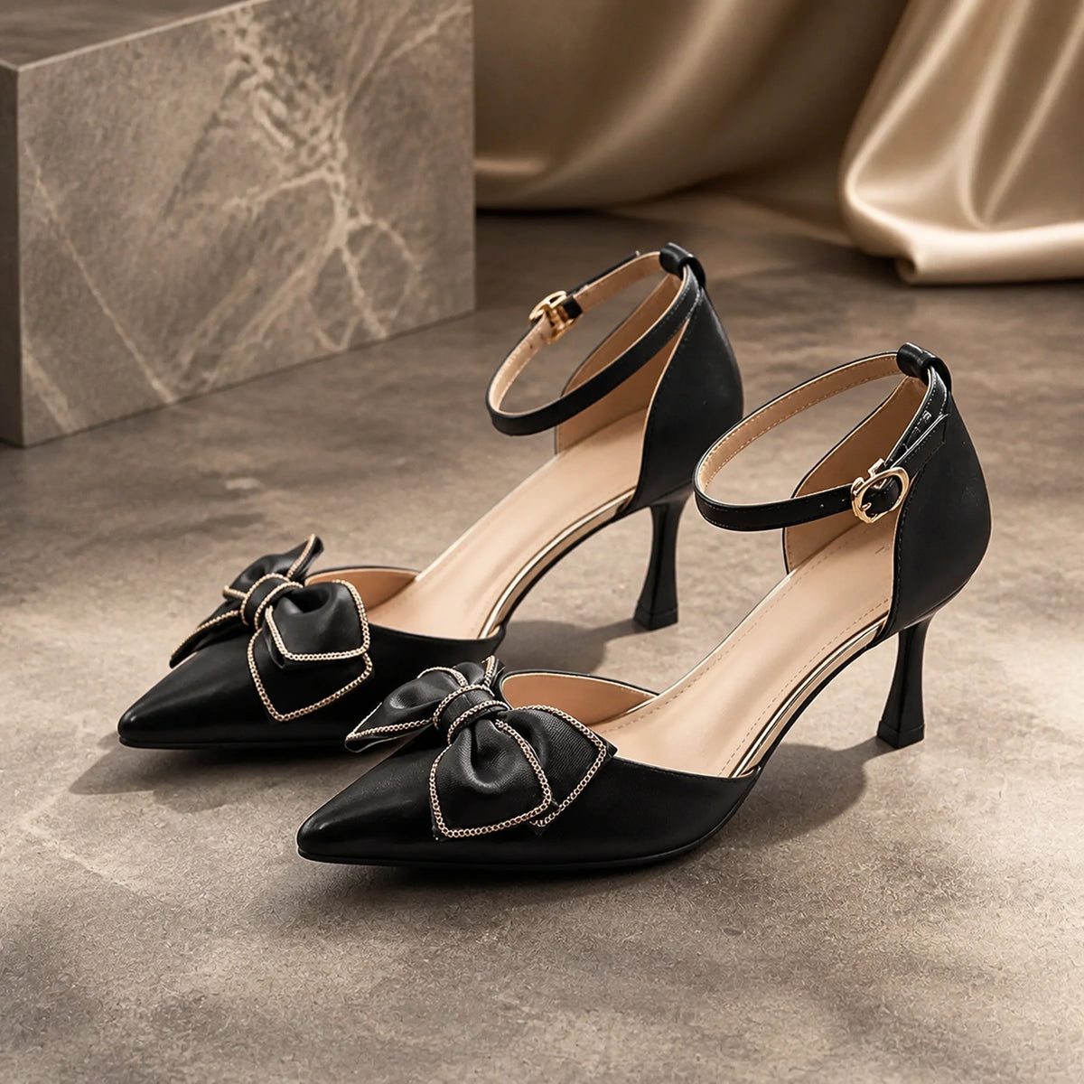 Black bow detail pointed toe ankle strap wedding guest shoes front view — view 2