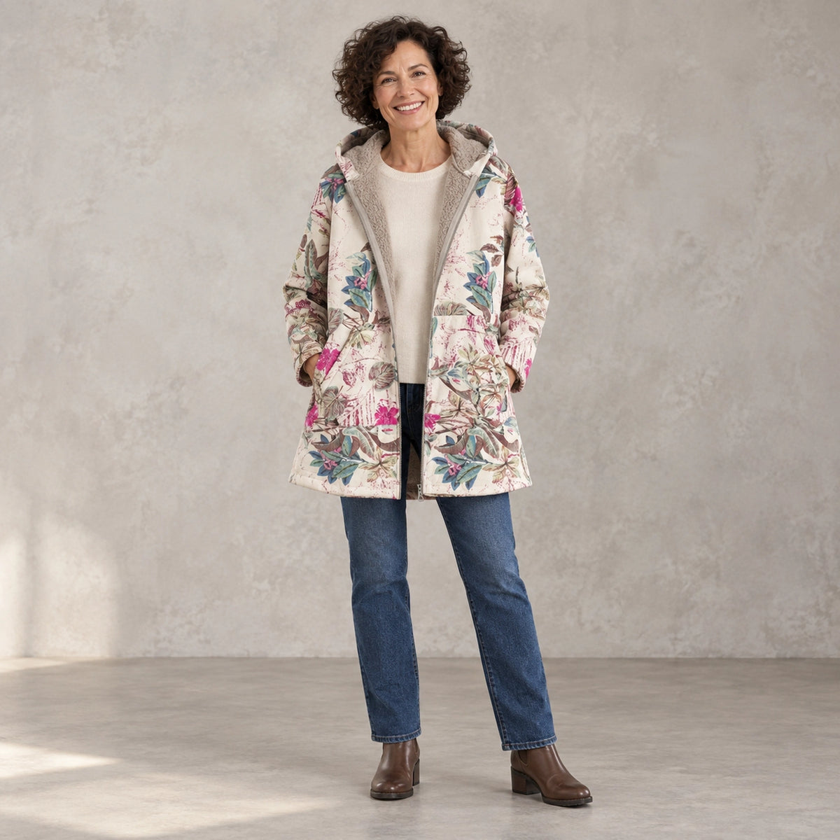winter coat — Full front view; Pink Floral; complete product worn by a happy adult model — view 2
