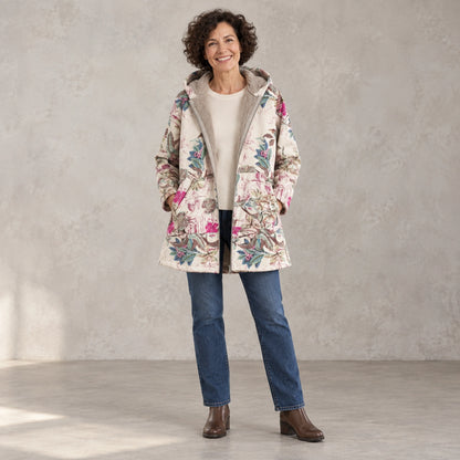 winter coat — Full front view; Pink Floral; complete product worn by a happy adult model — view 2
